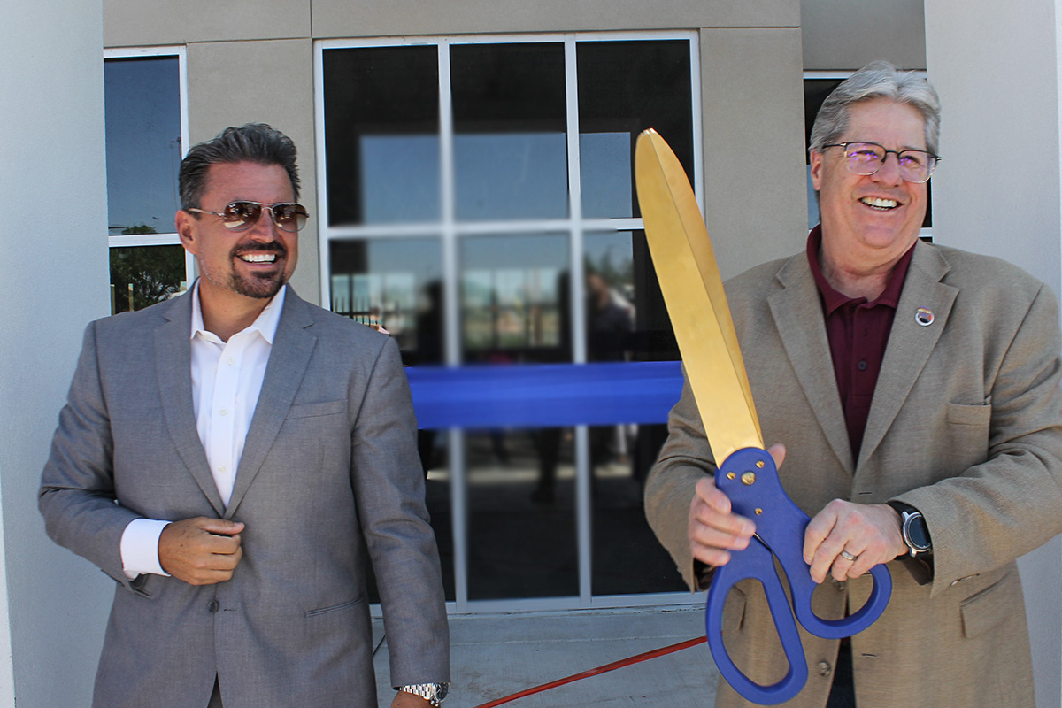 Members Attend Ribbon Cutting at 1645 University